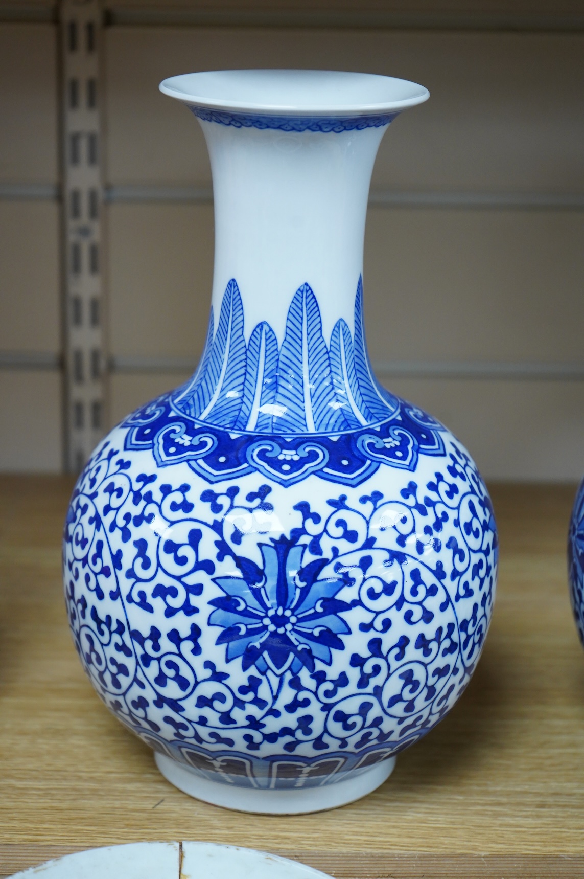 A pair of Chinese blue and white vases, 28cm high